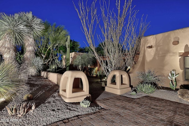 view of patio at night