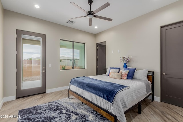2516 W Joy Ranch Rd, Phoenix, AZ 85086 - bedroom with light wood finished floors, baseboards, recessed lighting, and access to exterior