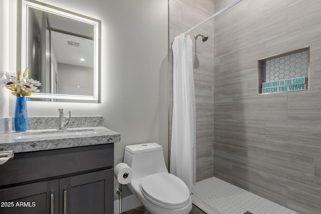 2516 W Joy Ranch Rd, Phoenix, AZ 85086 - full bathroom with vanity, a tile shower, and toilet