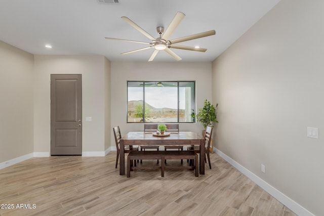 2516 W Joy Ranch Rd, Phoenix, AZ 85086 - dining area featuring light wood-style flooring, baseboards, a ceiling fan, and recessed lighting