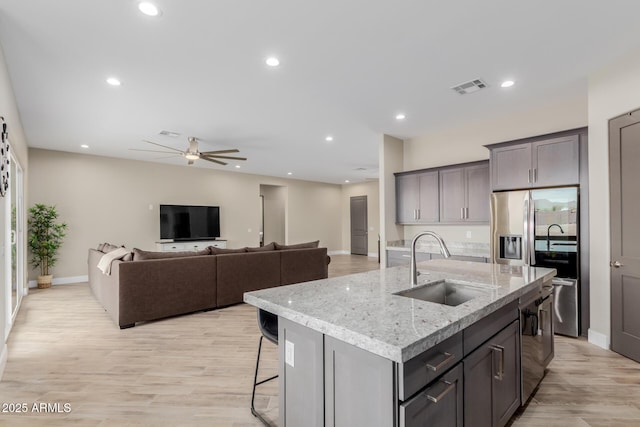2516 W Joy Ranch Rd, Phoenix, AZ 85086 - kitchen featuring a sink, stainless steel fridge with ice dispenser, ceiling fan, baseboards, and recessed lighting