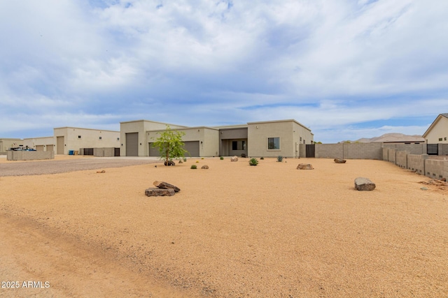2516 W Joy Ranch Rd, Phoenix, AZ 85086 - rear view of property featuring stucco siding