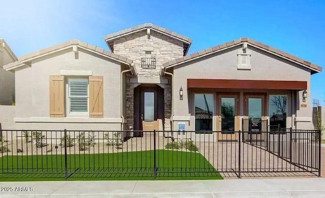 16336 W Jackson St, Goodyear, AZ 85338 - view of front of house featuring stucco siding and stone siding