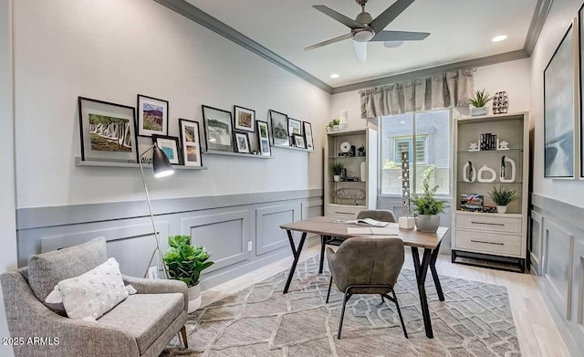 16336 W Jackson St, Goodyear, AZ 85338 - home office featuring ornamental molding, a decorative wall, light wood-type flooring, ceiling fan, and wainscoting