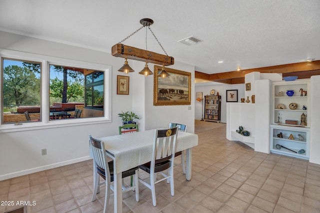 dining room featuring recessed lighting and baseboards
