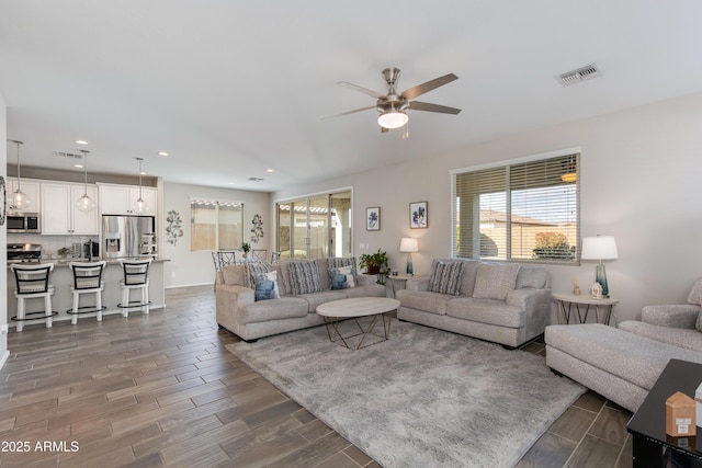 living room with ceiling fan