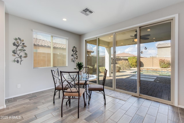 dining area with ceiling fan