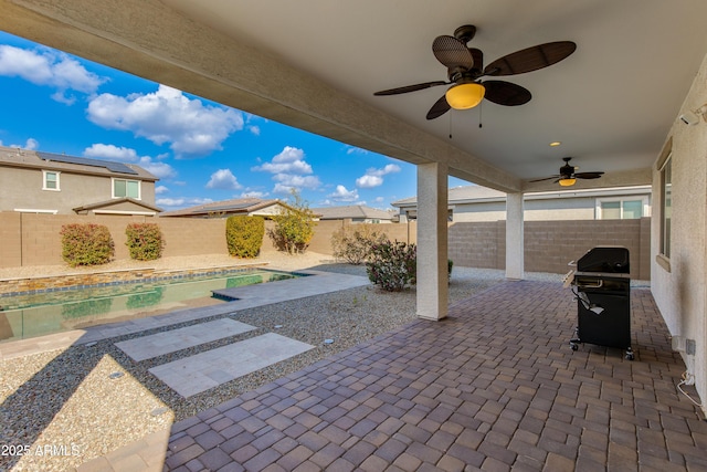 view of patio / terrace with a grill and ceiling fan