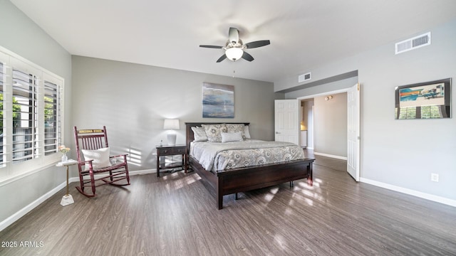 bedroom featuring ceiling fan and dark hardwood / wood-style floors