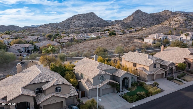 drone / aerial view featuring a mountain view