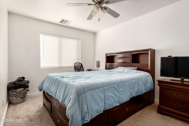 bedroom with a ceiling fan, light colored carpet, visible vents, and baseboards