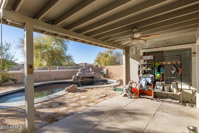 view of patio / terrace with a fenced backyard, a ceiling fan, and a fenced in pool