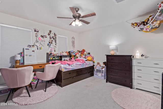 carpeted bedroom featuring ceiling fan