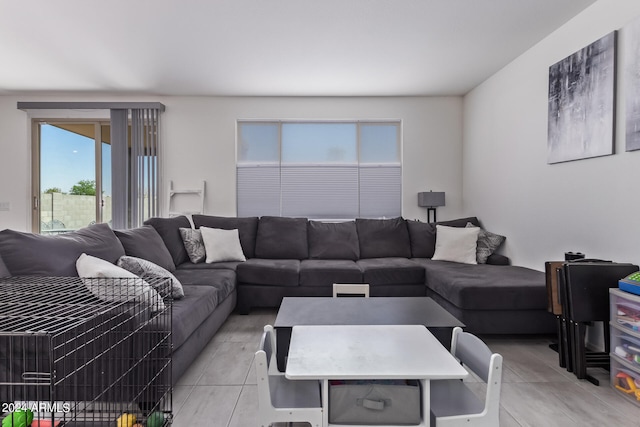 living room featuring light tile patterned floors