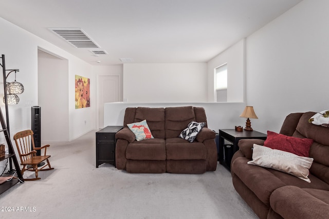 living room featuring light colored carpet