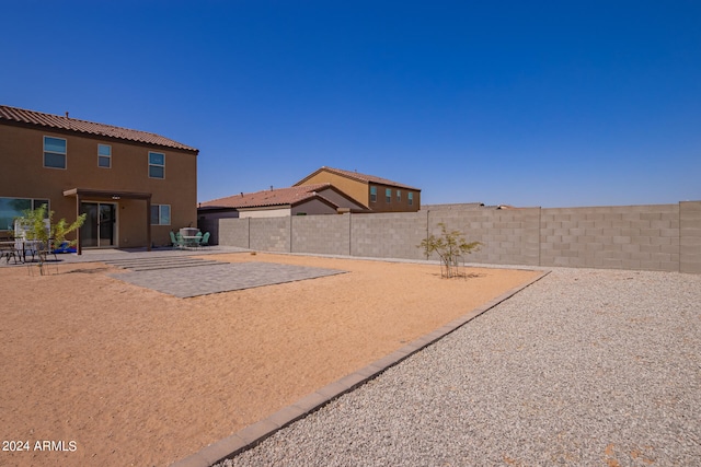 surrounding community featuring a patio area