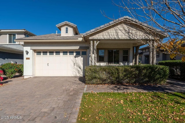 view of front of property with a garage