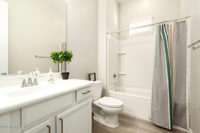 full bathroom with toilet, vanity, shower / bath combo, and hardwood / wood-style floors