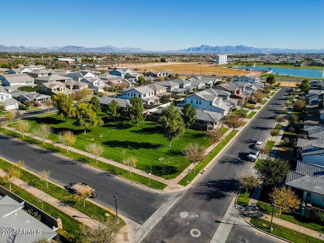 aerial view featuring a water and mountain view