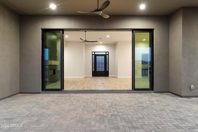 view of patio with ceiling fan