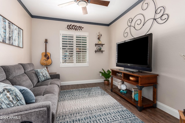 living room featuring crown molding, ceiling fan, and dark wood-type flooring