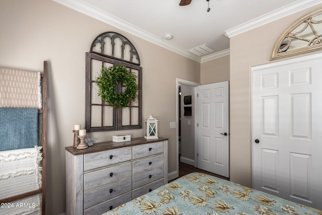 bedroom featuring crown molding and ceiling fan