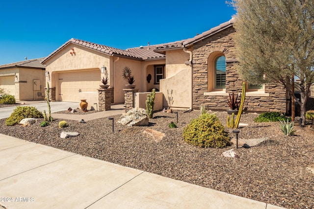 view of front of home with a garage