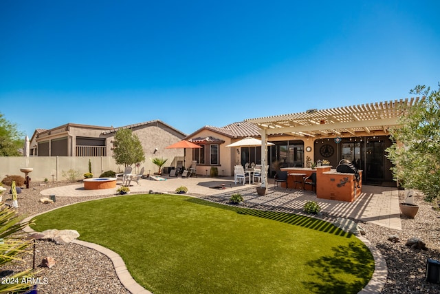 back of house featuring a patio, a pergola, an outdoor bar, and a yard