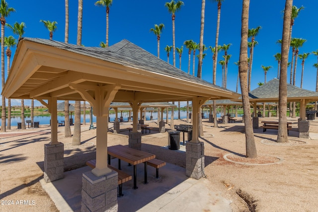 view of home's community featuring a gazebo and a water view