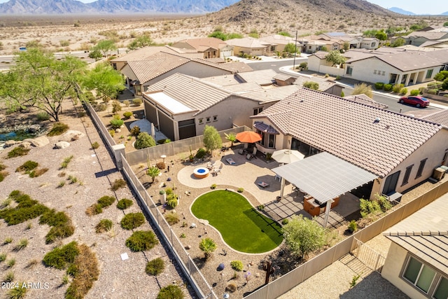 drone / aerial view featuring a mountain view