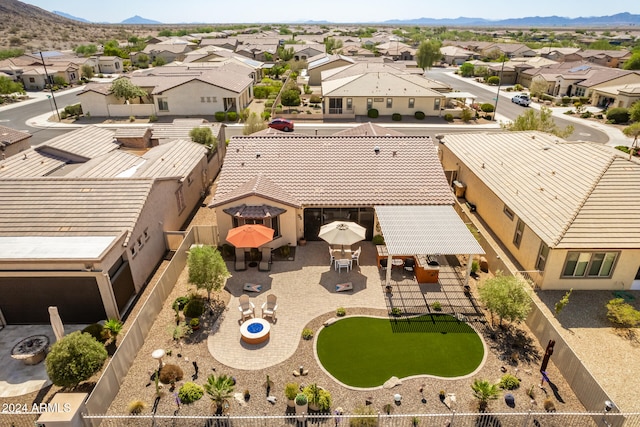 bird's eye view with a mountain view