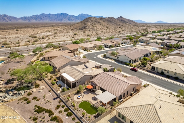 drone / aerial view featuring a mountain view