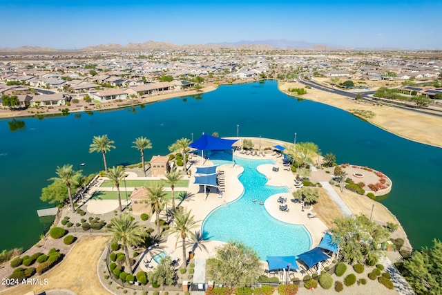 bird's eye view featuring a water and mountain view