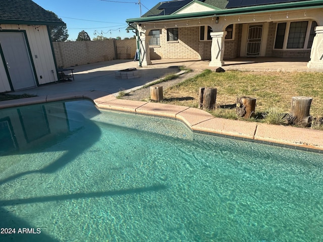 view of pool featuring a patio area