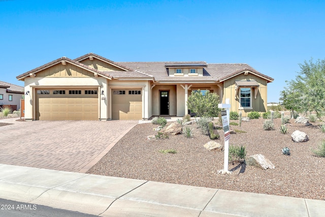 craftsman-style house featuring a garage