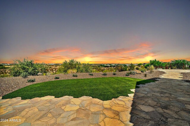 patio terrace at dusk with a gazebo