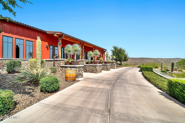 view of home's exterior with a mountain view