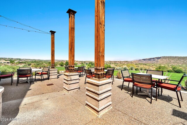 view of patio featuring a mountain view