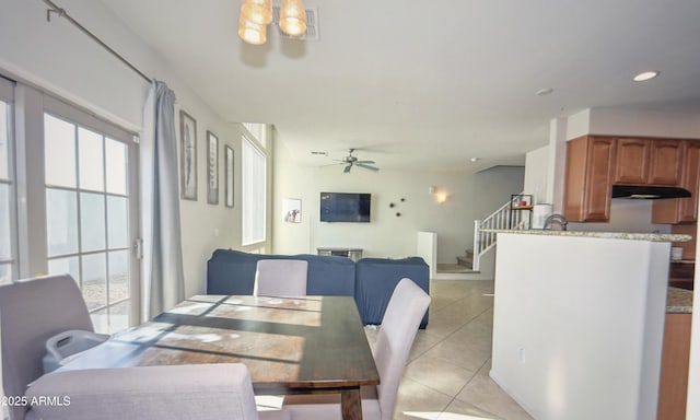 1851 W Vermont Ave, Phoenix, AZ 85015 - dining room with stairs, light tile patterned floors, ceiling fan, a chandelier, and recessed lighting