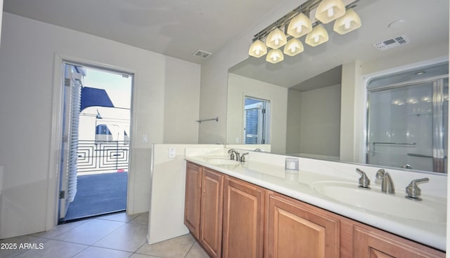 1851 W Vermont Ave, Phoenix, AZ 85015 - bathroom with double vanity, tile patterned flooring, and a stall shower