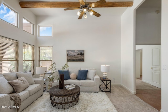 13680 E Paradise Dr, Scottsdale, AZ 85259 - living area featuring baseboards, carpet flooring, a high ceiling, beam ceiling, and ceiling fan