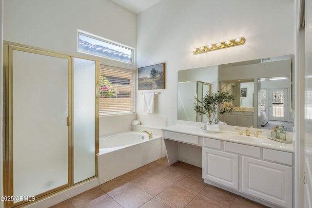 13680 E Paradise Dr, Scottsdale, AZ 85259 - bathroom with tile patterned floors, a bath, and a stall shower