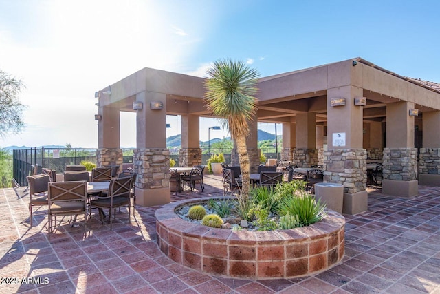 13680 E Paradise Dr, Scottsdale, AZ 85259 - view of patio with a gazebo, fence, and outdoor dining space