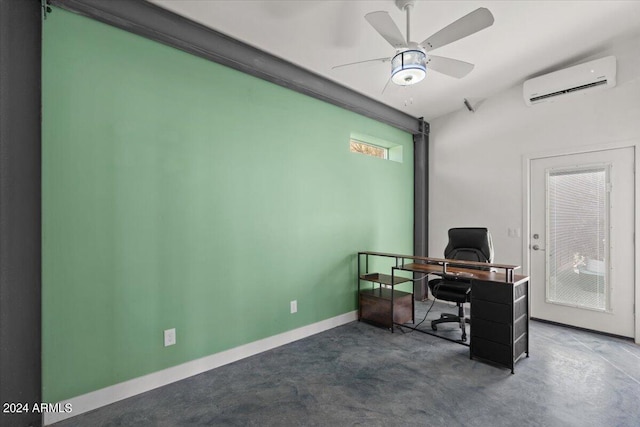 office with a ceiling fan, concrete floors, an AC wall unit, and baseboards