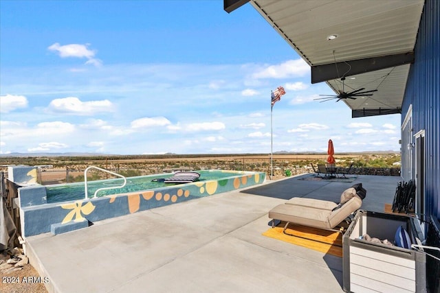 pool with a patio area