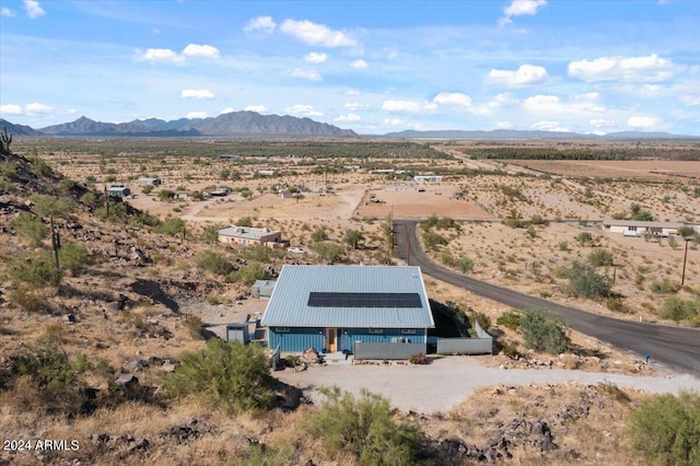 bird's eye view featuring a rural view, view of desert, and a mountain view