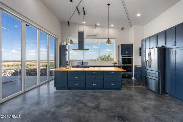 kitchen featuring appliances with stainless steel finishes, a center island, hanging light fixtures, finished concrete floors, and island range hood