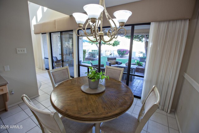 2635 N 62nd St, Mesa, AZ 85215 - dining room featuring baseboards, a notable chandelier, and light tile patterned flooring
