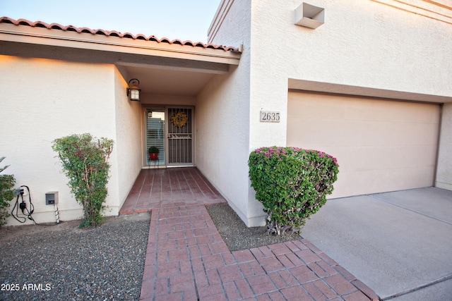 2635 N 62nd St, Mesa, AZ 85215 - entrance to property with concrete driveway, a garage, and stucco siding