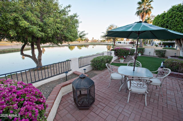 2635 N 62nd St, Mesa, AZ 85215 - view of patio with a water view, outdoor dining area, and a fenced backyard